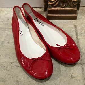 Repetto Women's Red Ballet Flats. Small dot on left toe. Barely noticeable.